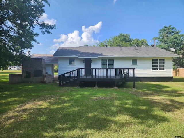 216 Mattison St, Pittsburg, TX 75686 - back of house with a wooden deck and a yard