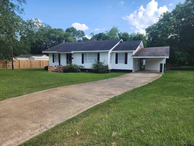 216 Mattison St, Pittsburg, TX 75686 - ranch-style home with driveway, an attached carport, and roof with shingles
