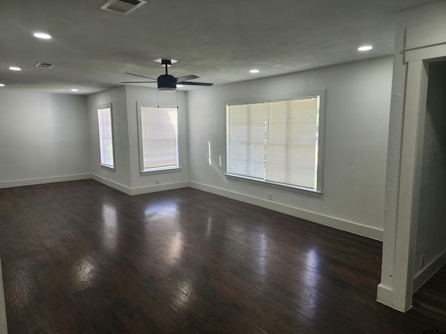 216 Mattison St, Pittsburg, TX 75686 - empty room featuring dark wood finished floors, recessed lighting, and a ceiling fan