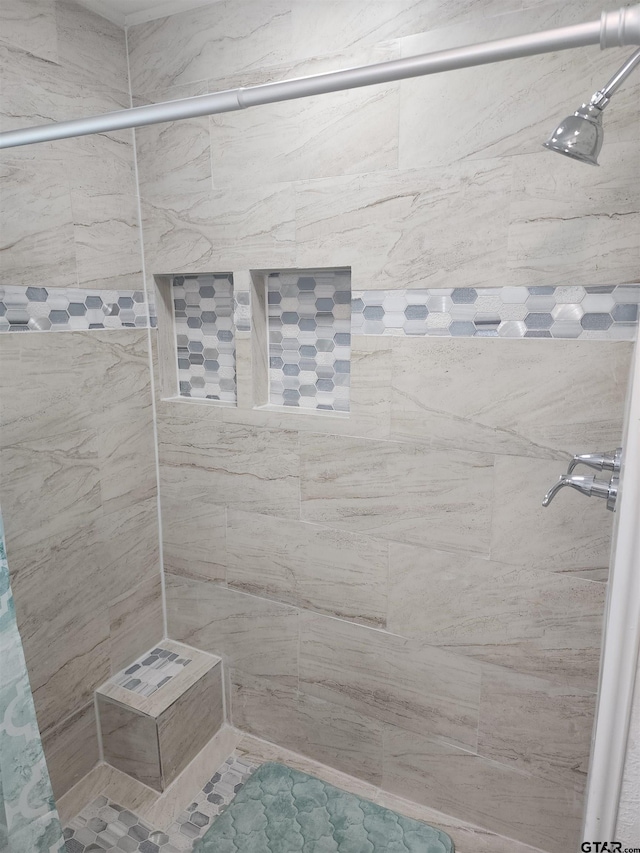 216 Mattison St, Pittsburg, TX 75686 - bathroom featuring tiled shower