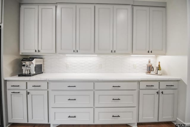 7863 Cross Rd, Tyler, TX 75703 - kitchen with backsplash and light stone counters