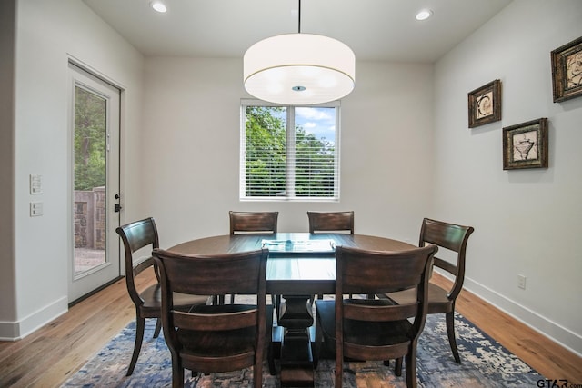 7863 Cross Rd, Tyler, TX 75703 - dining room with recessed lighting, wood finished floors, and baseboards