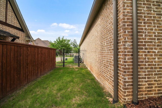 7863 Cross Rd, Tyler, TX 75703 - view of property exterior featuring brick siding and central AC
