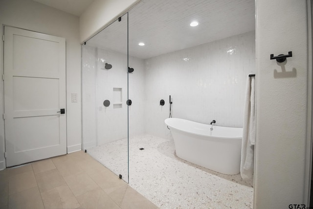 7863 Cross Rd, Tyler, TX 75703 - bathroom with a freestanding bath, walk in shower, and recessed lighting