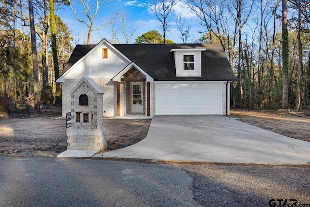 view of front of property featuring a garage