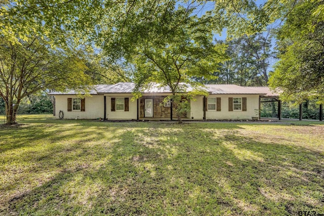 2010 County Road 4250, Winnsboro, TX 75494 - single story home with a front yard and metal roof