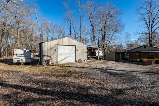 garage with a carport