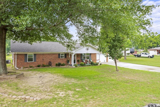 5513 Bostick Dr, Tyler, TX 75707 - ranch-style home with driveway, brick siding, a front lawn, an attached garage, and roof with shingles