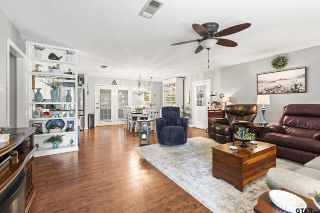 5513 Bostick Dr, Tyler, TX 75707 - living area with a chandelier, a ceiling fan, and wood finished floors