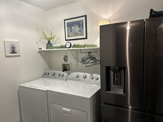 laundry room featuring laundry area and independent washer and dryer