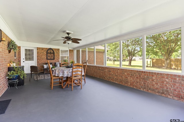 5513 Bostick Dr, Tyler, TX 75707 - sunroom with ceiling fan and outdoor dining area