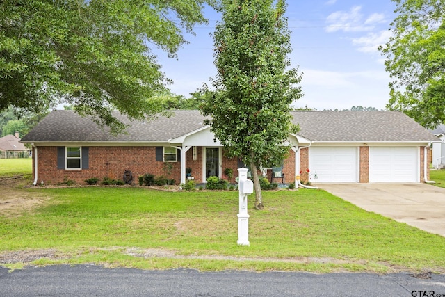 5513 Bostick Dr, Tyler, TX 75707 - single story home with driveway, an attached garage, a front lawn, brick siding, and roof with shingles
