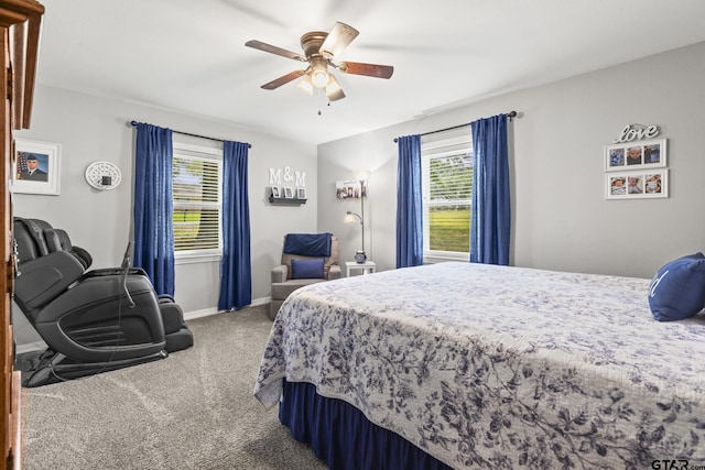 5513 Bostick Dr, Tyler, TX 75707 - carpeted bedroom featuring multiple windows, baseboards, and a ceiling fan