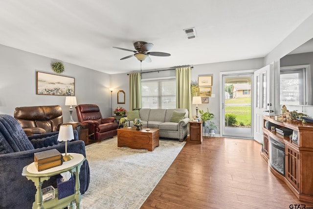 5513 Bostick Dr, Tyler, TX 75707 - living room featuring wood finished floors and a ceiling fan
