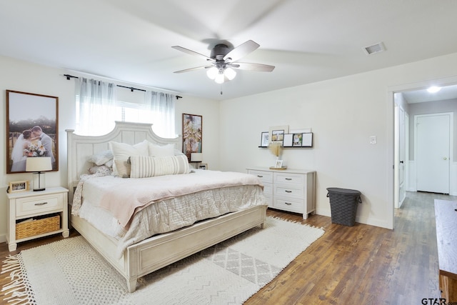 813 W Rieck Rd, Tyler, TX 75703 - bedroom with wood finished floors and ceiling fan