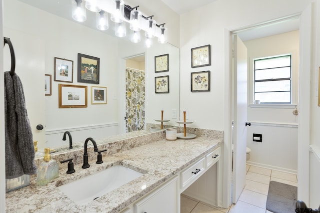 813 W Rieck Rd, Tyler, TX 75703 - bathroom featuring vanity and tile patterned flooring