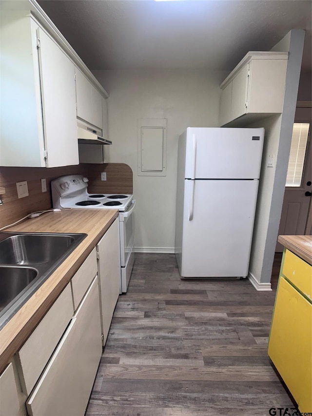 kitchen with white cabinetry, sink, dark wood-type flooring, and white appliances