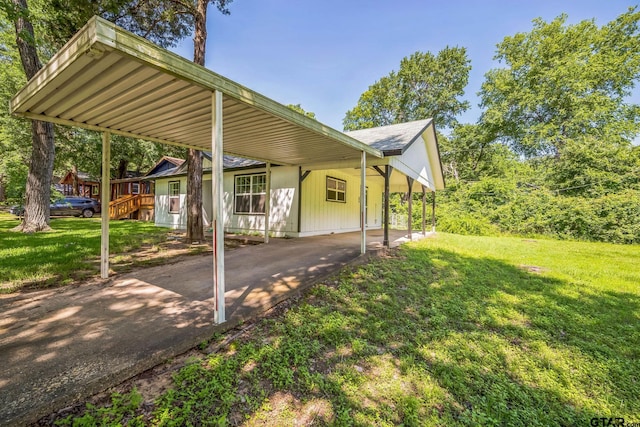 521 Hilltop Dr, Tool, TX 75143 - view of property exterior featuring a lawn and an attached carport