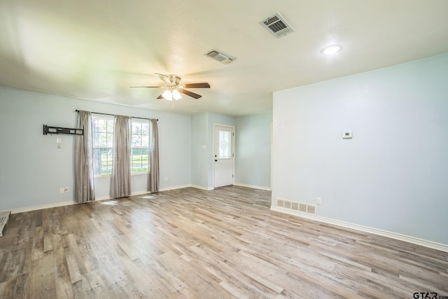 521 Hilltop Dr, Tool, TX 75143 - empty room with ceiling fan, light wood-type flooring, and baseboards