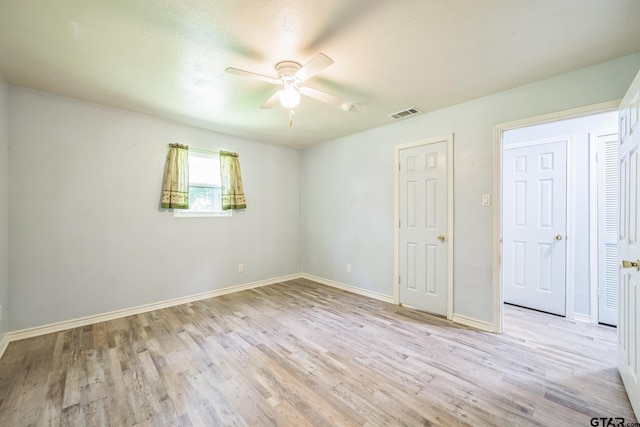 521 Hilltop Dr, Tool, TX 75143 - spare room with a ceiling fan, light wood finished floors, and baseboards