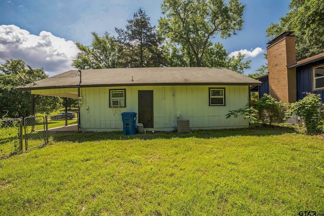 521 Hilltop Dr, Tool, TX 75143 - back of house with a gate and central AC unit