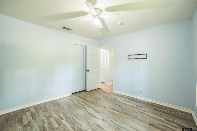 521 Hilltop Dr, Tool, TX 75143 - unfurnished bedroom featuring baseboards, wood finished floors, and a closet