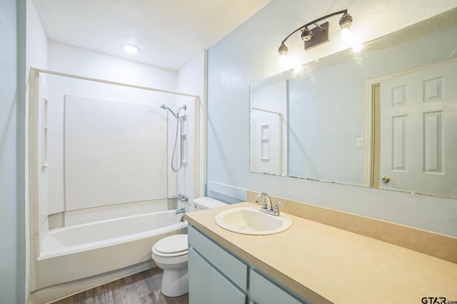521 Hilltop Dr, Tool, TX 75143 - bathroom featuring toilet, wood finished floors, vanity, and shower / washtub combination