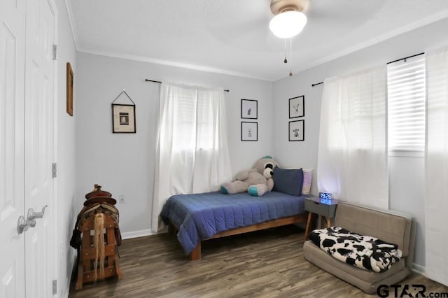 150 Gambrell St, Rusk, TX 75785 - bedroom with wood finished floors, crown molding, and ceiling fan