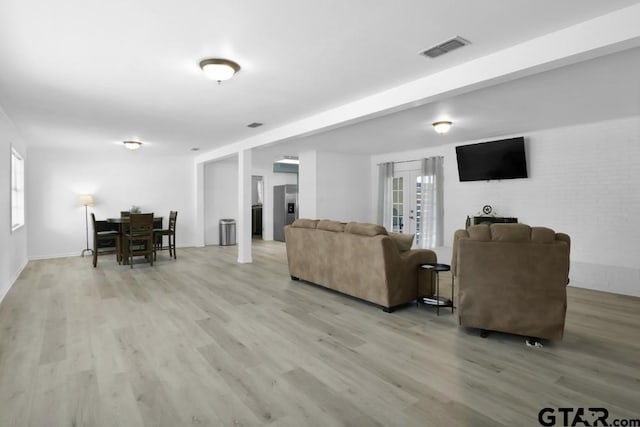150 Gambrell St, Rusk, TX 75785 - living area featuring light wood-style floors and baseboards