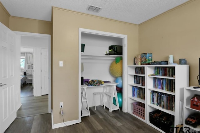 150 Gambrell St, Rusk, TX 75785 - bedroom with wood finished floors and a textured ceiling