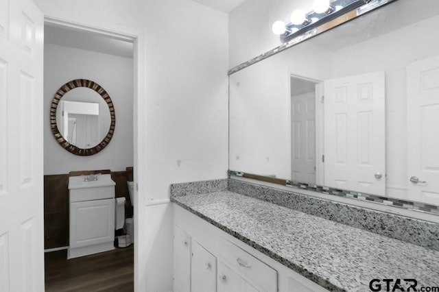 150 Gambrell St, Rusk, TX 75785 - bathroom with wood finished floors and vanity
