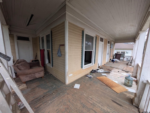 wooden deck featuring covered porch