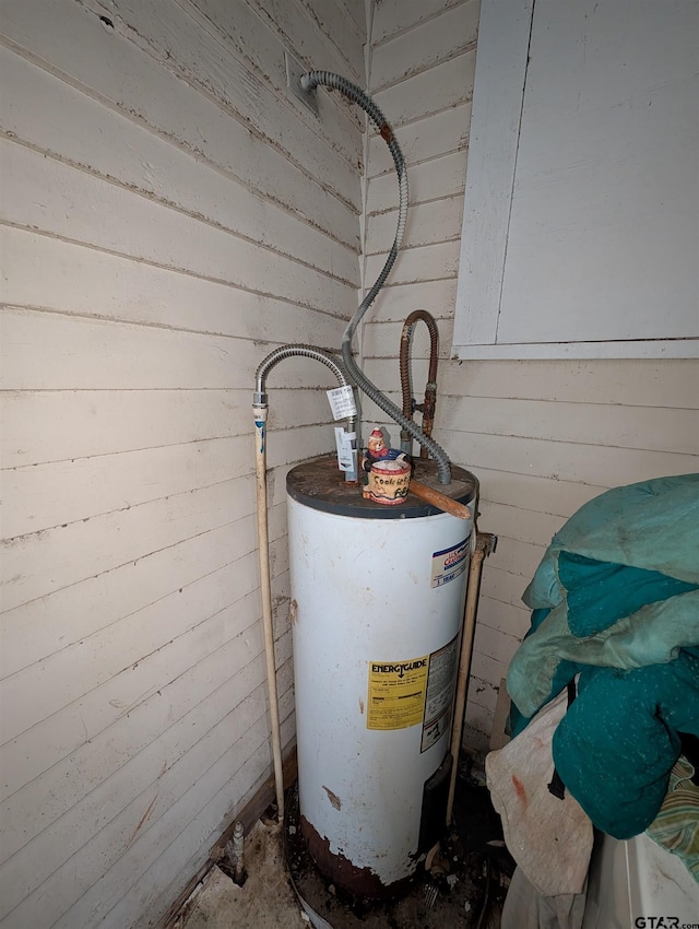 utility room with water heater