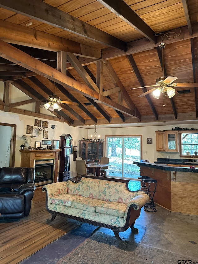 living room with sink, wooden ceiling, vaulted ceiling with beams, and ceiling fan with notable chandelier