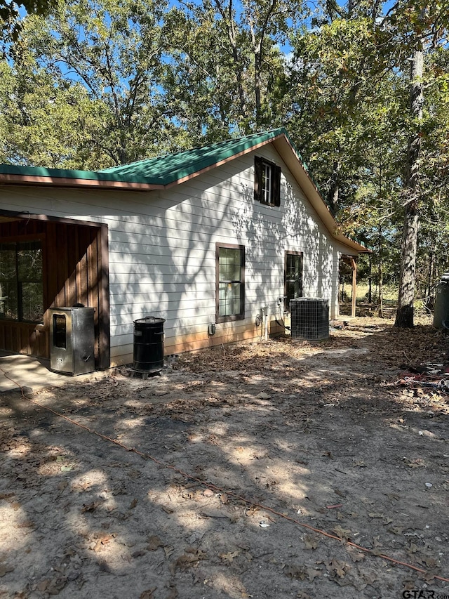 view of property exterior with central air condition unit