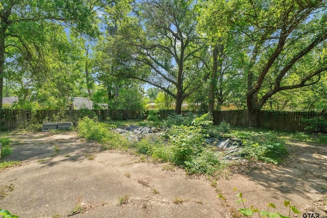 view of yard featuring fence