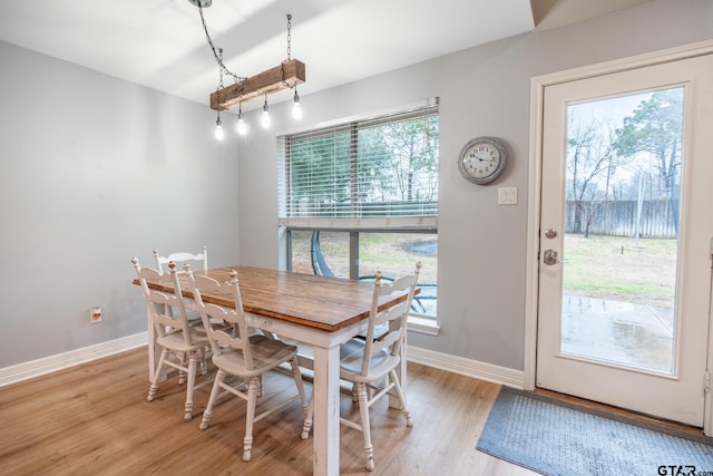 dining room featuring light hardwood / wood-style floors