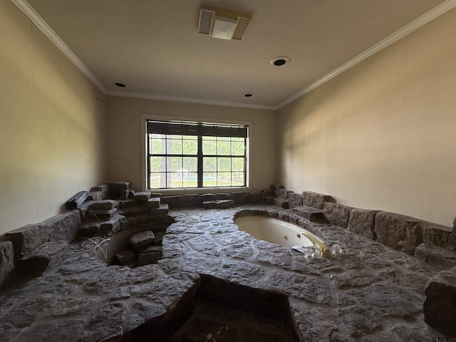 interior space with ornamental molding and visible vents