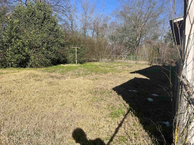 view of yard with fence