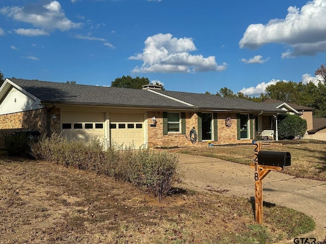 single story home with a garage