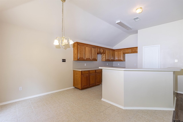 221 Maggie Cir, Flint, TX 75762 - kitchen with lofted ceiling, brown cabinetry, light countertops, and a chandelier
