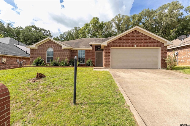 221 Maggie Cir, Flint, TX 75762 - ranch-style house featuring an attached garage, concrete driveway, brick siding, and a front lawn