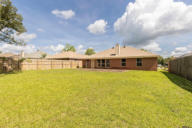 221 Maggie Cir, Flint, TX 75762 - rear view of property featuring a patio area and brick siding