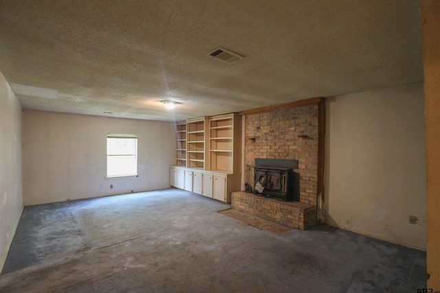 14832 Fm 2661, Flint, TX 75762 - unfurnished living room with carpet flooring and a textured ceiling