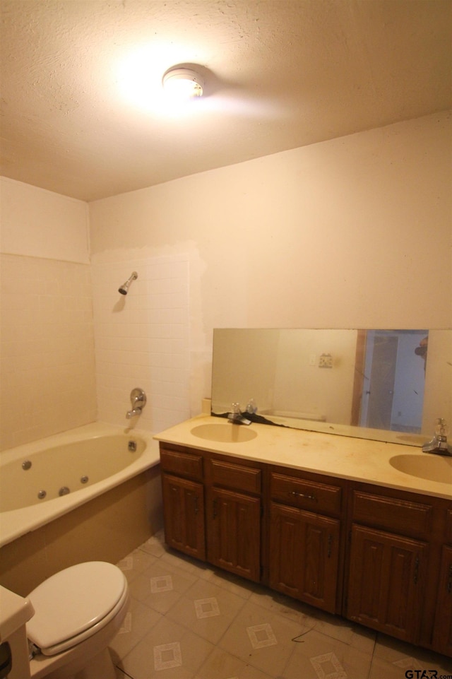 14832 Fm 2661, Flint, TX 75762 - bathroom with toilet, tile patterned flooring, double vanity, and a textured ceiling