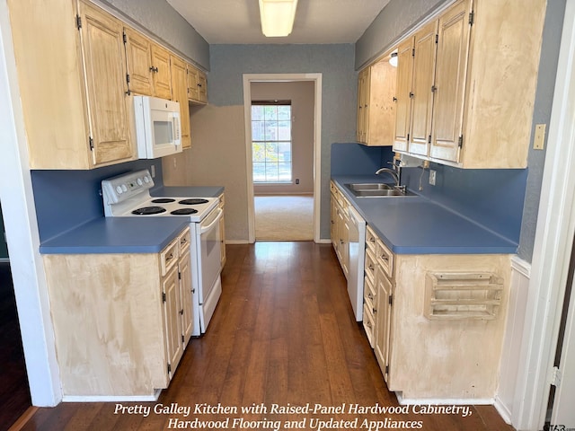 3900 S Donnybrook Ave, Tyler, TX 75703 - kitchen with white appliances, a sink, dark wood-style flooring, light brown cabinets, and baseboards