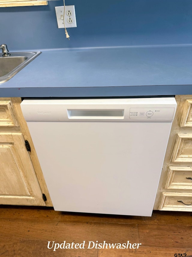 3900 S Donnybrook Ave, Tyler, TX 75703 - kitchen view of white dishwasher, wood finished floors, and a sink