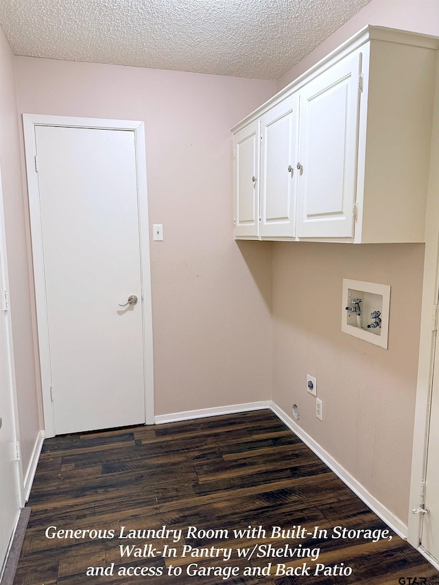 3900 S Donnybrook Ave, Tyler, TX 75703 - laundry room featuring hookup for a washing machine, hookup for an electric dryer, dark wood-style flooring, cabinet space, and a textured ceiling