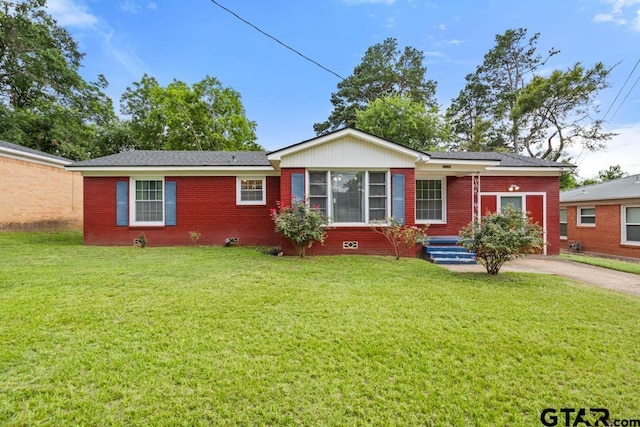 1135 E Sixth St, Tyler, TX 75701 - single story home with brick siding and a front yard