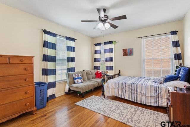 1135 E Sixth St, Tyler, TX 75701 - bedroom featuring light wood-type flooring and ceiling fan